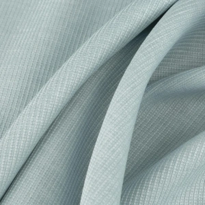 Závěs Aparte,  světle modrý, jemná melanž s ozdobným proužkovým splotem, šití na míru