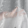 439984 záclona Reva bílá+stříbrná detail3.webp